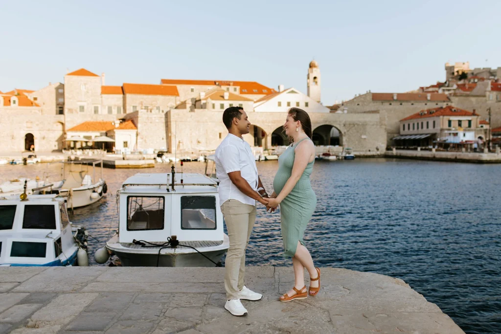 couple holding hands in dubrovnik