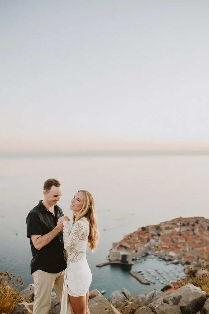 portrait of engaged couple above dubrovnik