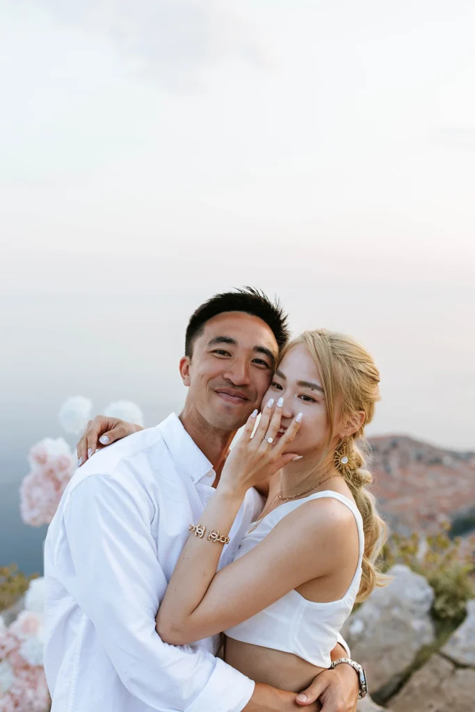 happy couple just engaged, woman happy to wear a ring