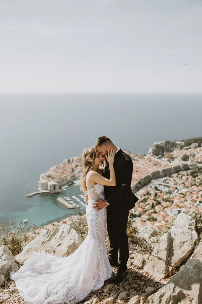 bride and groom at srdj mountain above dubrovnik