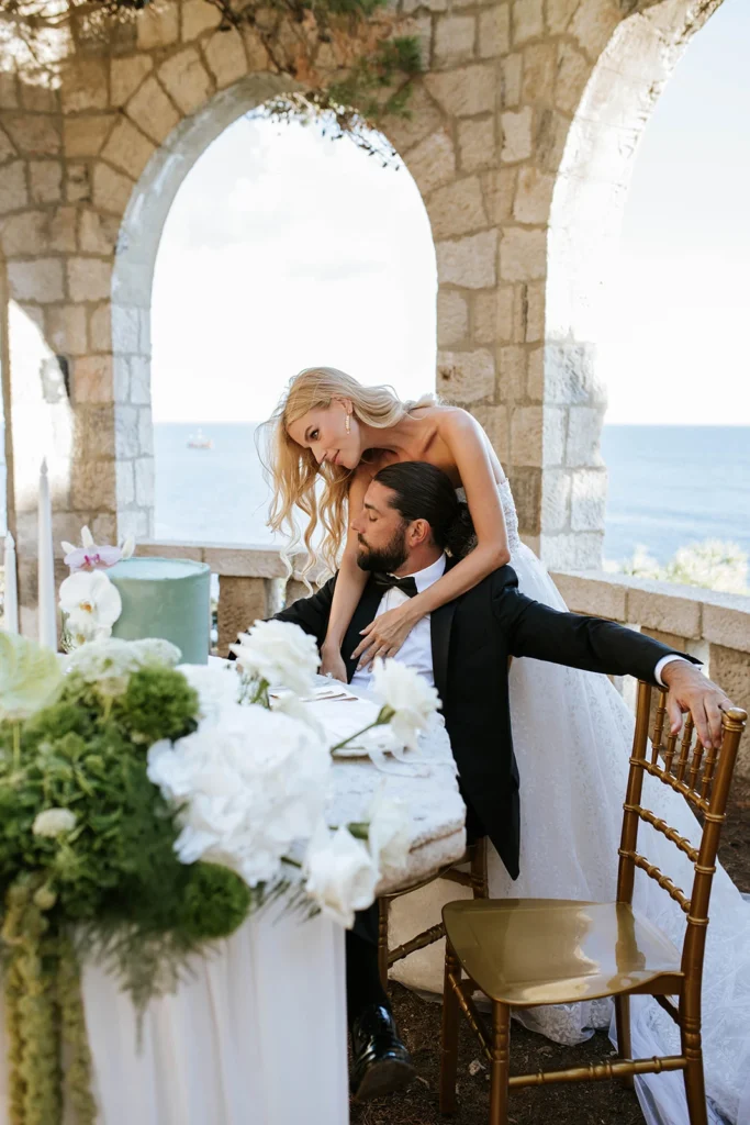 bride hugging broom
