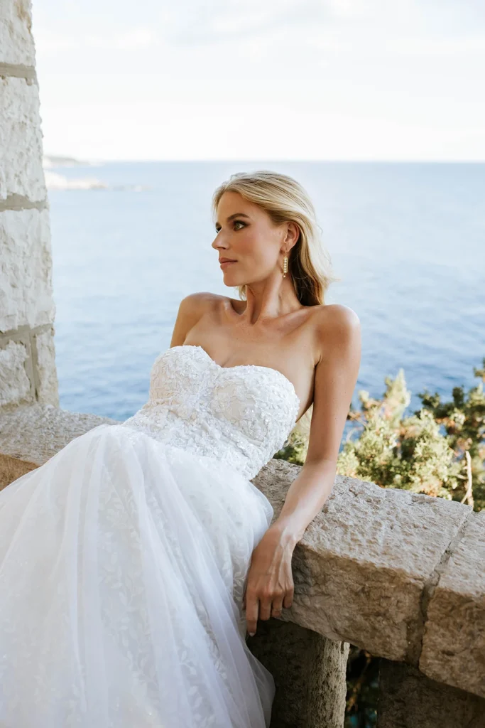 bride with white dress with view to the adriatic sea
