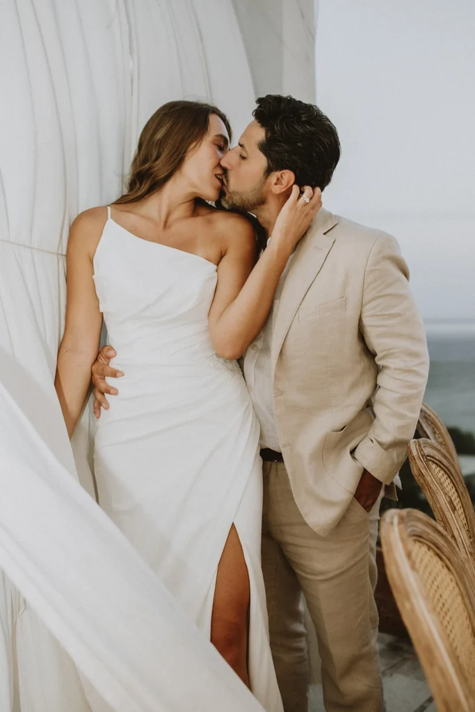 husband kissing his wife